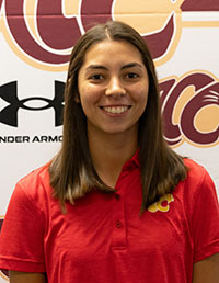 Smiling female student with straight brown hair