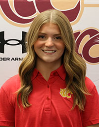 Smiling female student with dark blond hair